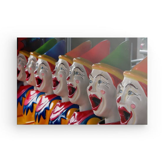 Step into a world of chilling beauty with "Carnival Nightmares." This captivating canvas print features a row of ceramic clowns, each with a colorful yet unsettling look. Add a touch of eerie intrigue to your space with this haunting artwork.